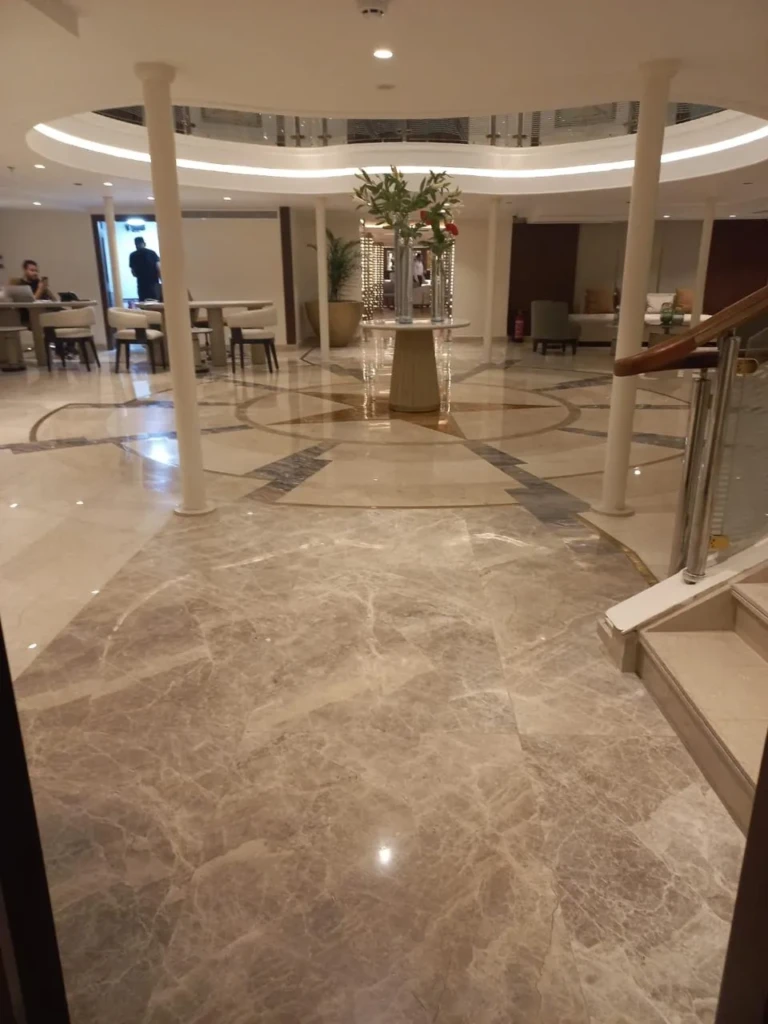 Marble lobby with columns and seating on the Sonesta Star Goddess