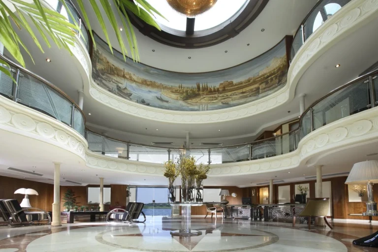 Multi-level atrium lobby with painted dome on the Sonesta Star Goddess