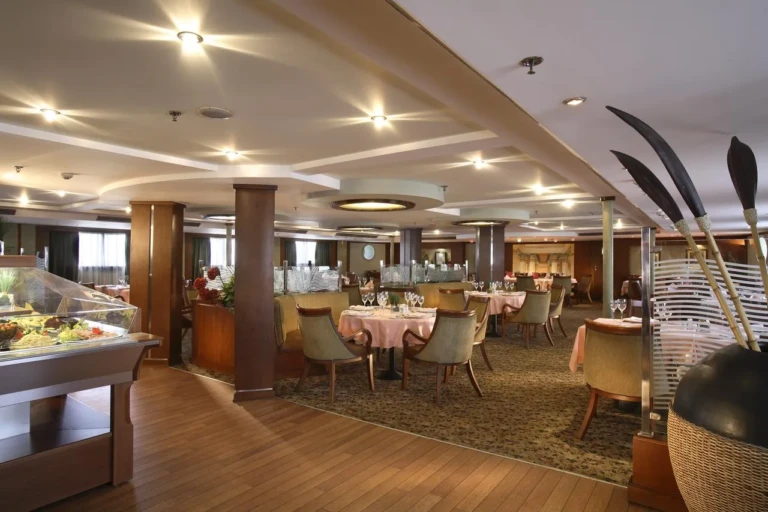 Sonesta Star Goddess restaurant with buffet and set tables