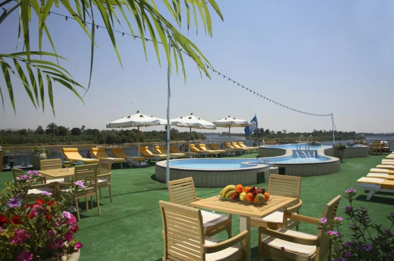 Sun deck pool with loungers and umbrellas on the Sonesta Star Goddess