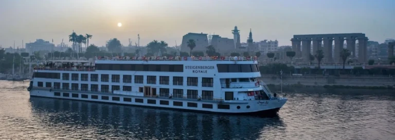 Steigenberger Royale Nile cruise ship passing Luxor Temple