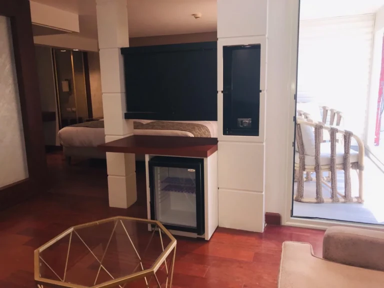 Suite with TV unit, minibar and balcony door on the Sun Goddess