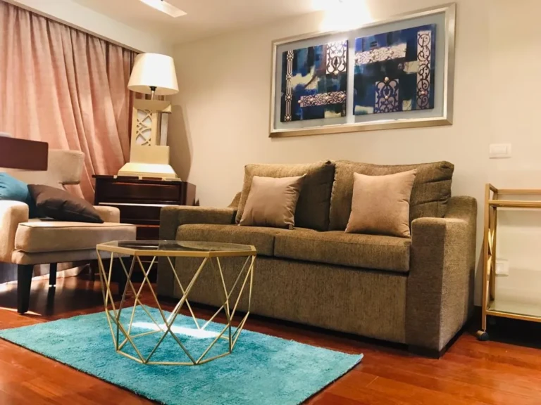 Suite sofa with geometric glass coffee table on the Sun Goddess