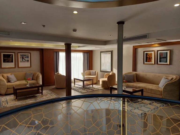 Seating area around a circular atrium railing on the Sun Goddess