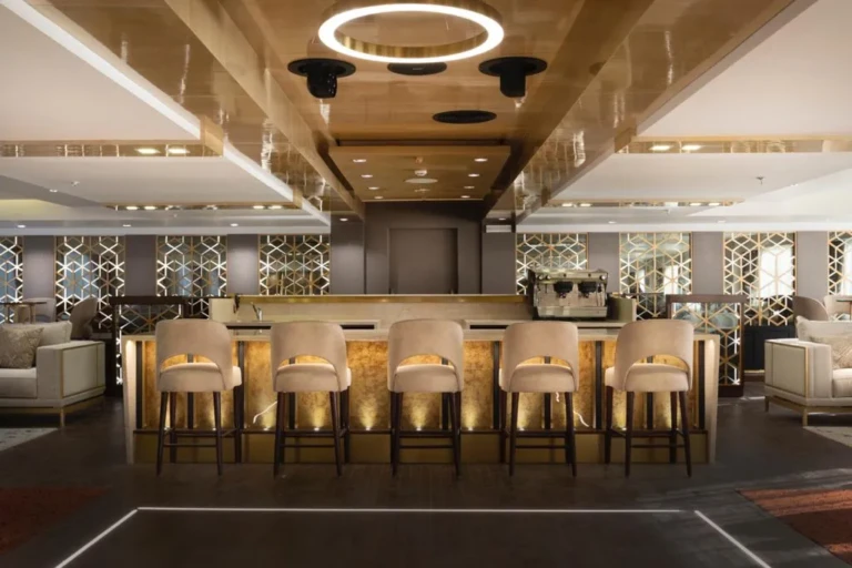 Bar counter with high stools and ring light on the Sun Goddess