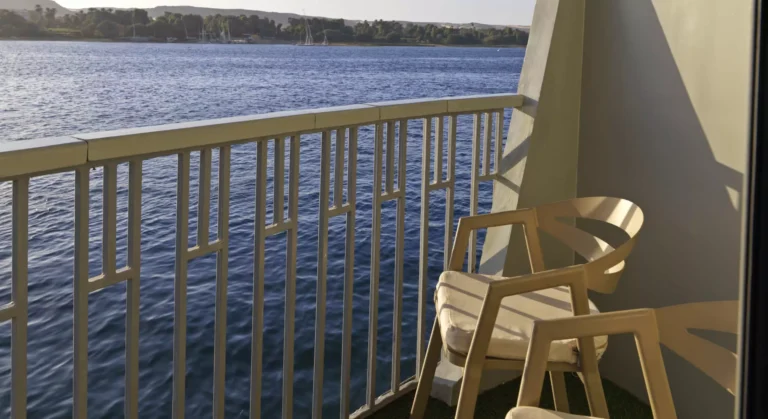 Wooden chair on a Tulip cabin balcony above the Nile