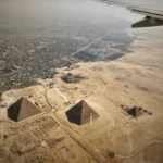 Aerial view of the Giza pyramids from a plane window