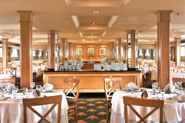 Restaurant with columns, buffet counter and set tables