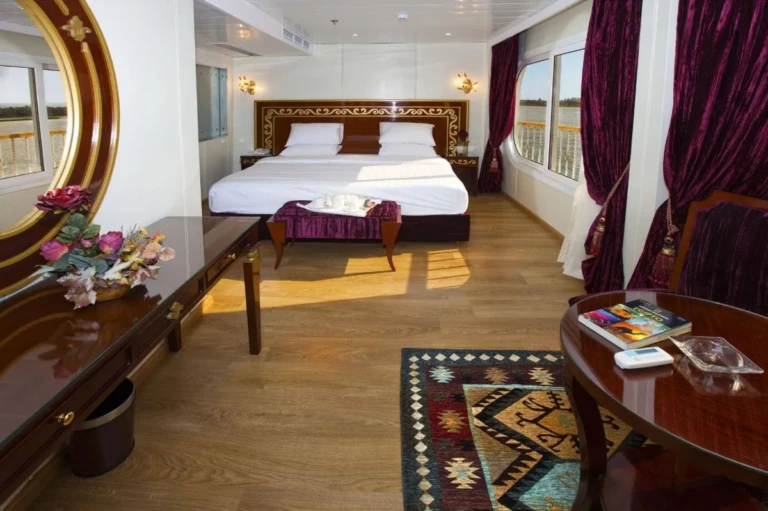 Long suite with double bed and patterned rug on the Al Hambra