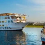 Al Hambra Nile cruise ship with a felucca in front