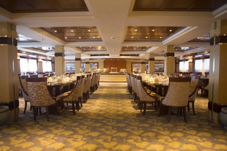 Blue Shadow restaurant with rows of upholstered chairs
