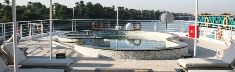Farida sun deck with round pool and loungers