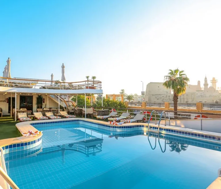 MS Salacia pool deck with sunbeds and palm trees