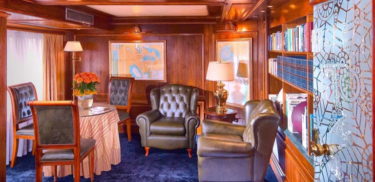 MS Salacia library with leather armchairs and bookshelves