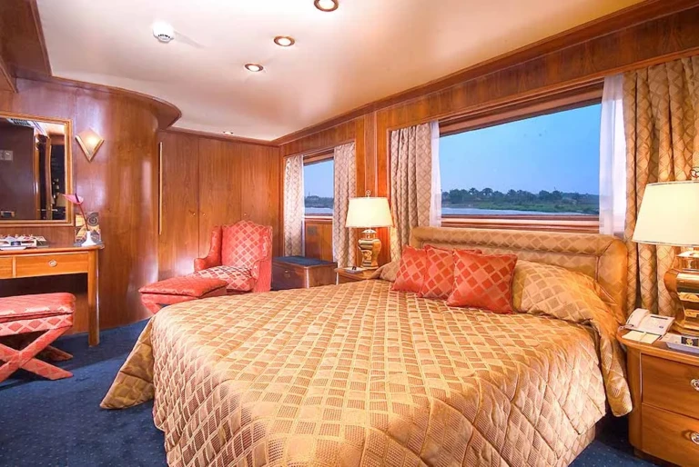MS Salacia wood-panelled suite with double bed and armchair