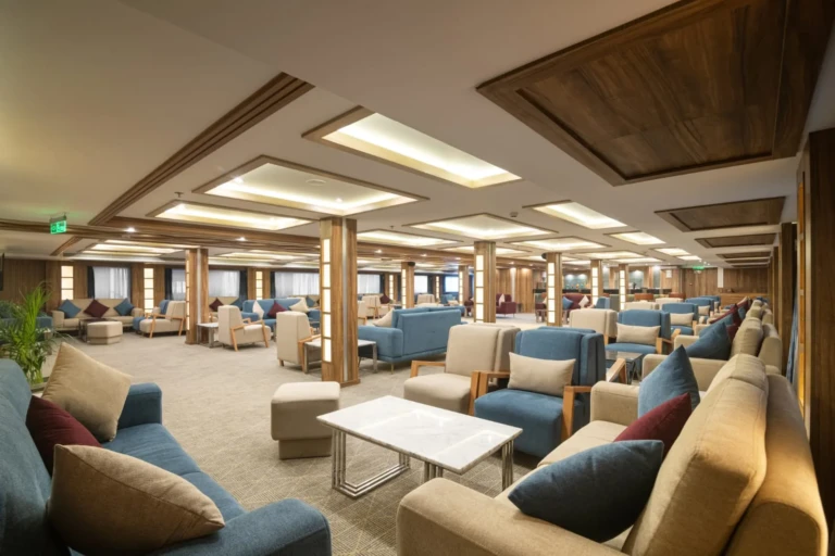 Nile Capital lounge with blue and beige armchairs