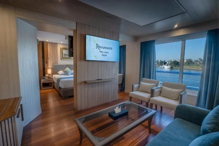 Renaissance suite with bedroom, sitting area and river view