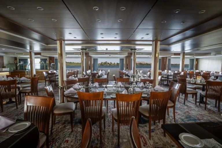 Renaissance restaurant with wooden chairs and set tables
