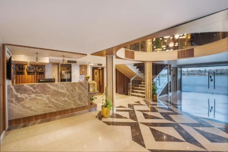 Renaissance reception desk and marble-floored lobby