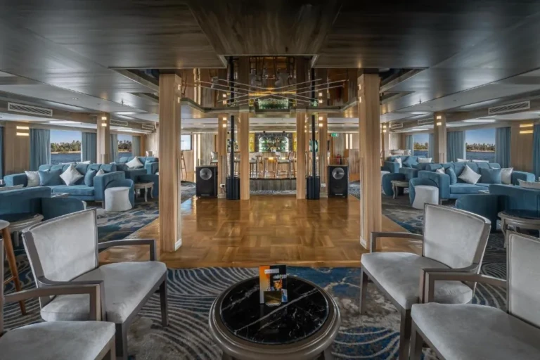 Renaissance main lounge with white armchairs and columns