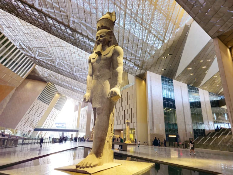 Colossal statue of Ramses II in the Grand Egyptian Museum atrium