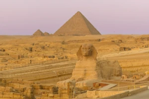 Great Sphinx with the pyramids of Giza behind