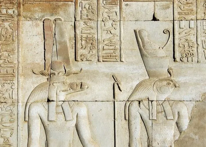 Relief of Sobek and Horus on a wall at Kom Ombo Temple